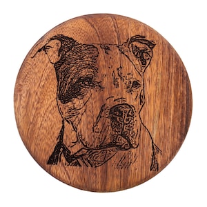 May include: A wooden round coaster with a laser engraved image of a brown and black pit bull dog.
