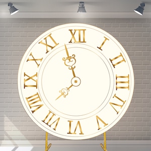 May include: A large, white, round clock face with gold Roman numerals and hands. The clock is on a gold stand against a white brick wall.