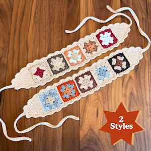 Two rustic granny square crochet headbands displayed on a wooden surface, showing different floral motif color combinations and labeled as two available styles.