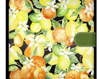May include: A black background with a repeating pattern of watercolor painted lemons, limes, and oranges with white blossoms. The pattern is framed with a white stitched border.