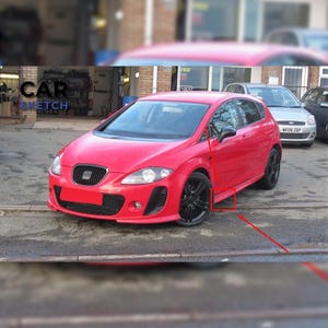 May include: A red hatchback car with black wheels is parked on a paved surface. The car has a sporty design with a black front grill and a red bumper. The text "CAR SKETCH" is visible in the background.