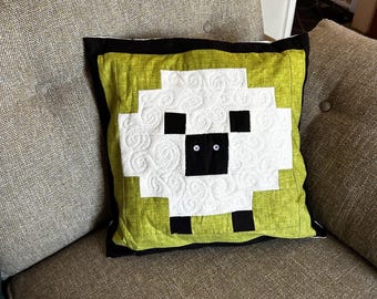 Luxury patchwork sheep quilted cushion cover.