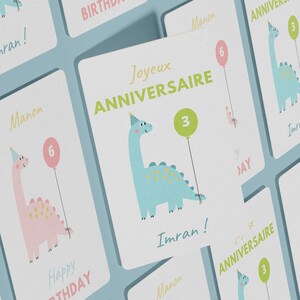 Carte anniversaire enfant carton de célébration dinosaure ballon bleu rose et vert carte de vœux célébration