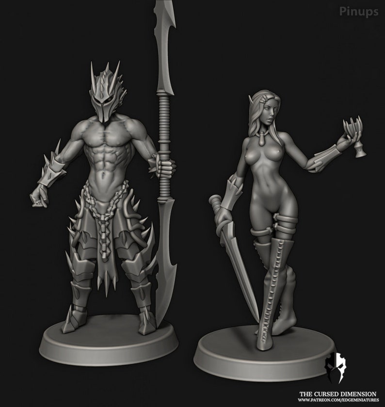 May include: Two miniature figures, one male and one female, posed in a dramatic fashion. The male figure is wearing armor and holding a spear, while the female figure is wearing a sword and a goblet. The figures are painted in a gray color scheme.