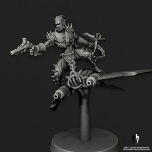 May include: A grey, detailed miniature of a goblin riding a futuristic, winged, multi-barreled weapon. The goblin is wearing armour and holding a pistol.