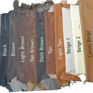 May include: A selection of leather swatches in various shades of brown, beige, and black. The swatches are labeled with their respective colors: Black, Brown, Light Brown, Tan Brown, Dark Brown, Tan, Light Tan, Beige 1, Beige 2, and Camel Beige.