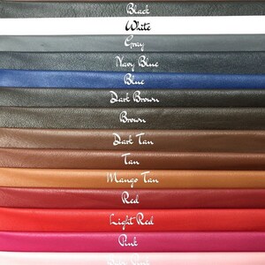 May include: A color chart of leather swatches in various colors, including black, white, gray, navy blue, blue, dark brown, brown, dark tan, tan, mango tan, red, light red, pink, and white. The colors are labeled with their names.
