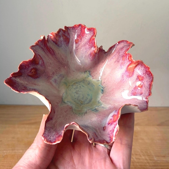 Wheel-thrown stoneware trinket bowl with that imperfect, tactile pottery quality you can't fake — real ceramics, not a mold.