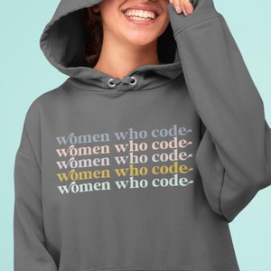 May include: Grey hooded sweatshirt with the text "women who code" repeated five times in different colours.