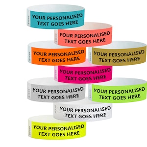 May include: A stack of colourful wristbands with the text "YOUR PERSONALISED TEXT GOES HERE" printed on each one.