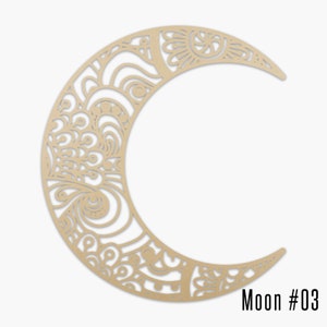 May include: A crescent moon-shaped wall decor piece with intricate cut-out designs. The moon is a light tan color and features a detailed pattern of swirls, circles, and floral elements. The text "Moon #03" is in the lower right corner.