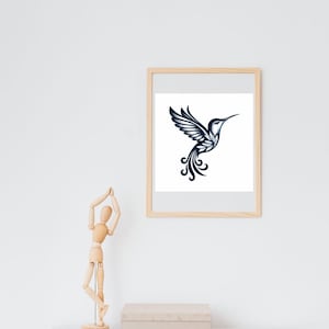 May include: A framed print of a black and white hummingbird illustration with a white background.