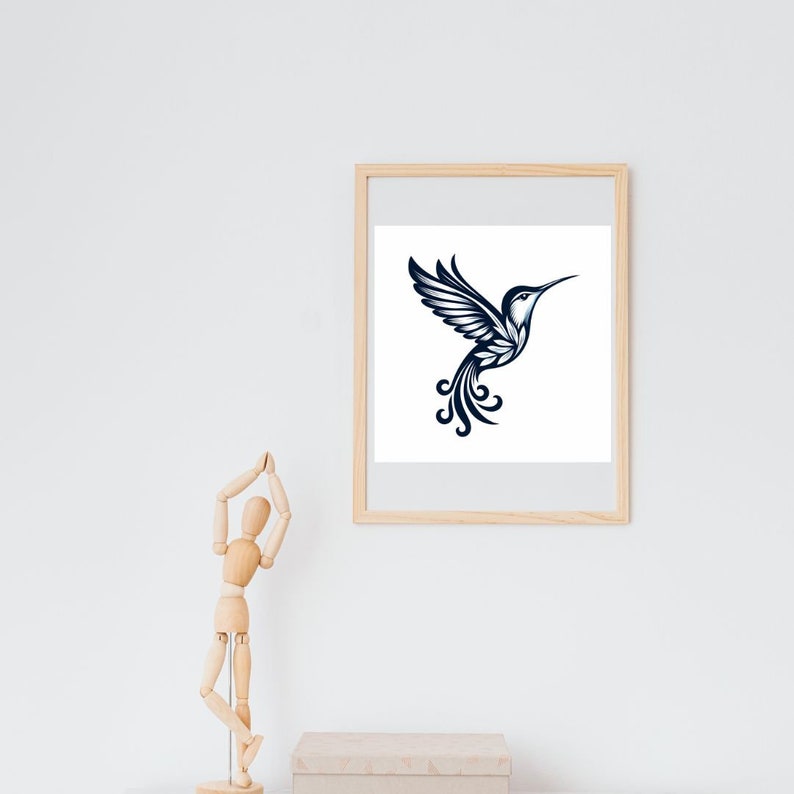 May include: A framed print of a black and white hummingbird illustration with a white background.