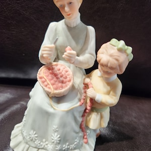 Enesco Figurine - &quot;Stringing Cranberries&quot;