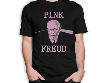 May include: A set of three ceramic mugs with a speckled, matte finish. The mugs are in shades of cream, light gray, and dark gray. Each mug has a simple, minimalist design and a rounded handle. The mugs are likely for coffee or tea.