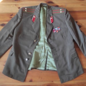 247_2024_Vintage military tunic of a lieutenant colonel of the USSR tank forces with medals and insignia original