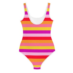 May include: A striped swimsuit with a white background and horizontal stripes in shades of red, orange, yellow, pink, and purple.