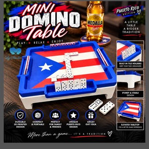 May include: A mini domino table featuring the Puerto Rico flag design with a blue border and white base. The table includes built-in tile holders and white dominoes with black pips. Text on the image reads Mini Domino Table, Puerto Rico Edition, A Little Table A Bigger Tradition, Play Relax Enjoy, and More than a game... It's a tradition.