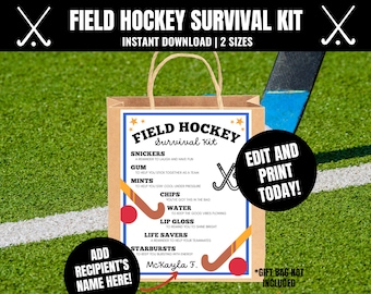 May include: A brown paper bag labeled "Field Hockey Survival Kit" with a list of items. The bag has a blue and white label with the text "Field Hockey Survival Kit". The background is a green field with white lines and a hockey stick.