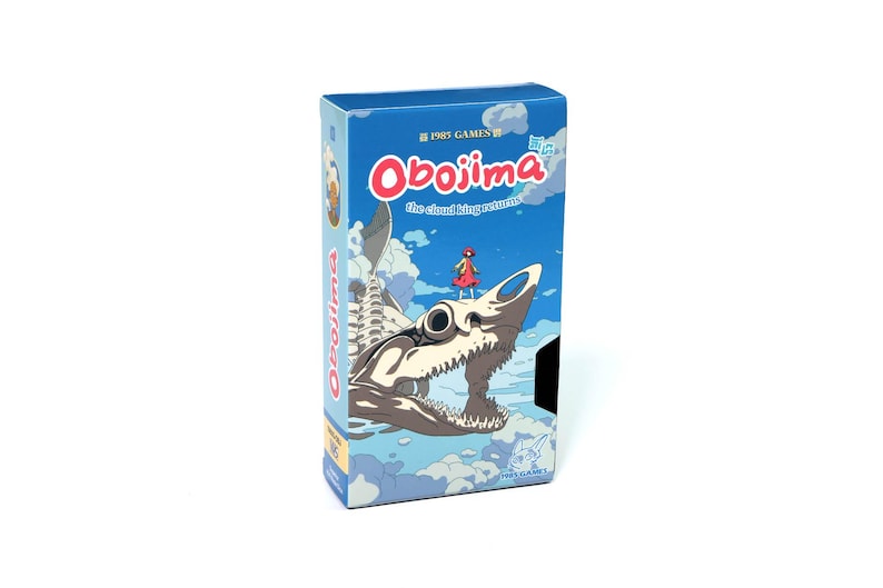 May include: A blue game box titled "Obojima: the cloud king returns." The box art depicts a skeletal creature with a person on its head, set against a blue sky with clouds. The game's title is in red.