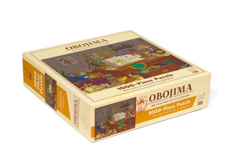 May include: A rectangular puzzle box with the word "OBOJIMA" in a bold font. The box features a colorful illustration of a room with various objects. The text "1000-Piece Puzzle" is also visible.