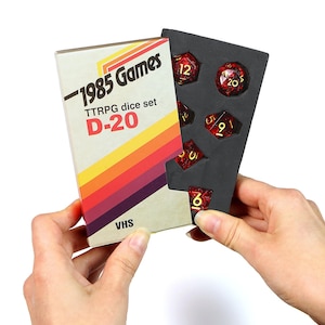Polyhedral Dice Set, Ruby Red Resin Sharp Edge with VHS Case