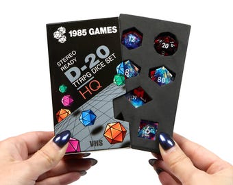 Plasmic Punch Resin Dice Set: Sharp Edge DnD RPG - VHS Retro Box