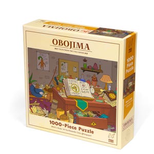 May include: A 1000-piece puzzle box with the title "OBOJIMA" and the subtitle "Tales from the Tall Grass." The box features an illustration of a cluttered desk with books, a lamp, and a whimsical cartoon scene. The box is beige and yellow.