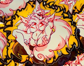 May include: A sticker featuring two pink and white foxes cuddling. The foxes have swirling patterns on their tails and are set against a yellow background with black accents.