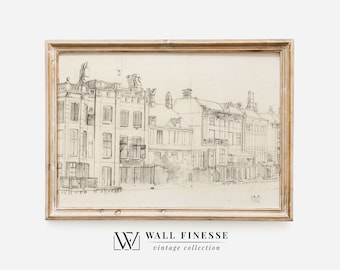 May include: A black and white pencil drawing of a row of buildings in a vintage style frame. The drawing is on a cream-colored paper with a light brown wood frame.