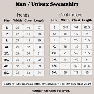 Peut inclure: Tableau des tailles pour un sweat-shirt unisexe, indiquant les mesures en pouces et en centim&egrave;tres pour les tailles S &agrave; 5XL. Le tableau comprend les mesures de largeur, de poitrine et de longueur.