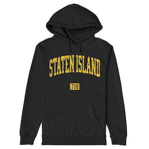 May include: Black hooded sweatshirt with a yellow distressed graphic that says "STATEN ISLAND" with the number "718" underneath.