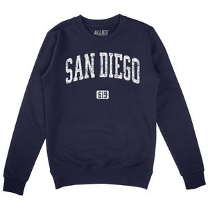 May include: Navy blue sweatshirt with a white distressed graphic that says "SAN DIEGO" with "619" underneath.