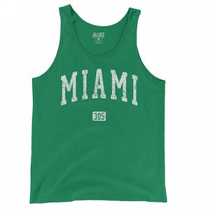May include: Green tank top with the word "MIAMI" in distressed white lettering across the chest, with "305" below. The tank top is a solid green color and has a scoop neck.