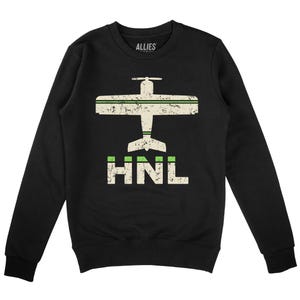May include: Black sweatshirt featuring a vintage-style graphic of a small plane and the text "HNL" in green and white.