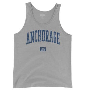 May include: Gray tank top with a blue distressed graphic that says "ANCHORAGE" with the number "907" underneath.