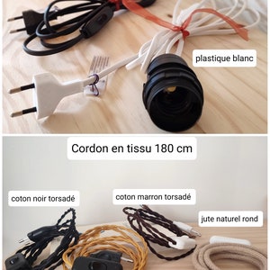 May include: A collection of electrical lamp cords featuring black and white plastic options measuring 150 to 200 cm, and fabric-covered cords in black, brown, gold, and natural jute measuring 180 cm, each equipped with a plug and a switch.