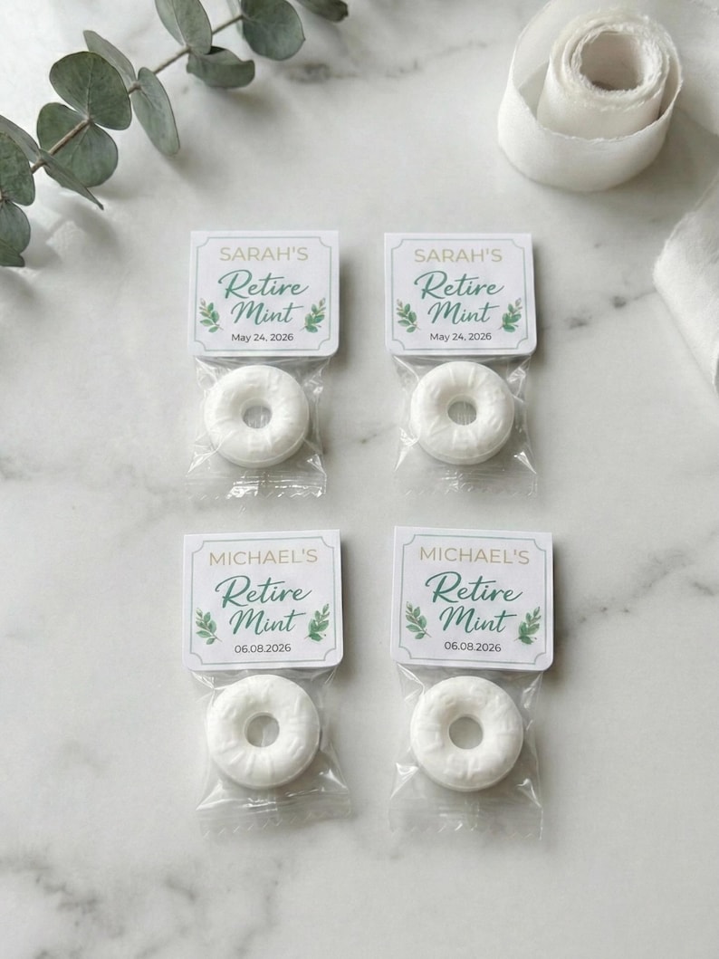 May include: Four individually packaged mints with tags that read "Retire Mint." Two are labeled "Sarah's" with the date "May 24, 2026," and two are labeled "Michael's" with the date "06.08.2026." The mints are white and donut-shaped.