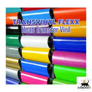 May include: Rolls of colorful heat transfer vinyl in various colors, including red, orange, yellow, green, blue, purple, and pink. The vinyl is labeled "Transvinyl Flexx Heat Transfer Vinyl".