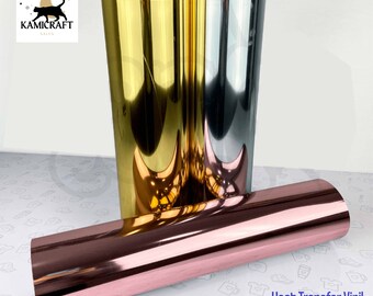 May include: Three rolls of heat transfer vinyl in gold, silver, and rose gold. The vinyl is soft stretch metallic and is designed for use on fabric.
