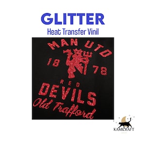 May include: Red glitter heat transfer vinyl with the text "MAN UTD 18 78 RED DEVILS Old Trafford" applied to a black t-shirt.