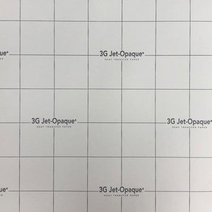 May include: A white sheet of heat transfer paper with a grid pattern. The paper has the text "3G Jet-Opaque" printed on it.