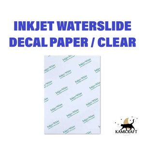 May include: A sheet of clear inkjet waterslide decal paper. The paper is printed with the words "Inkjet/White waterslide decal paper" repeated many times.
