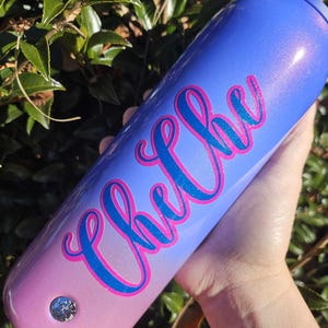 May include: A handmade wooden sign with the text "Welcome to our home" in a handwritten style. The sign is painted white with a distressed finish, and a small, decorative heart is attached. The sign measures approximately 12 inches wide.