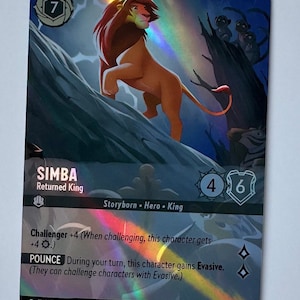 May include: A collectible card game card featuring Simba, the lion from Disney's The Lion King. The card is holographic and features a colorful rainbow effect. The card text reads "Simba, Returned King, Storyborn, Hero, King, Challenger +4 (When challenging, this character gets +4 ☉). Pounce: During your turn, this character gains Evasive. (They can challenge characters with Evasive.)" The card number is 215/204.