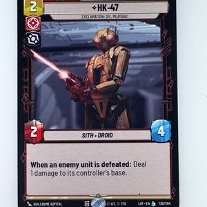 May include: A trading card featuring HK-47, a Sith Droid, with a red lightsaber. The card has a black border and includes the text "EXCLAMATION: DIE, MEATBAG!". The card also has the text "When an enemy unit is defeated: Deal 1 damage to its controller's base."