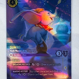 May include: A collectible card featuring Dumbo, the animated elephant, against a colorful, starry background. The card includes the text "Dumbo," "Ninth Wonder of the Universe," and game-related text. The card has a holographic finish and a number 4 in the upper left corner.