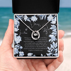 Collana A mia sorella con biglietto di auguri premuroso e opzione confezione regalo in legno