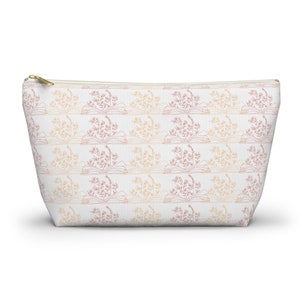 Pochette d&#39;accessoires orange avec fond en T