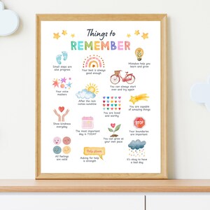 以下が含まれることがあります： 虹色のフォントで「Things to Remember」と書かれたカラフルな印刷可能なポスター。ポスターには、子供向けのイラスト入りのリマインダーが12個あり、「小さなステップも進歩です」「あなたのベストは常に十分です」「あなたは素晴らしいことができる」などがあります。